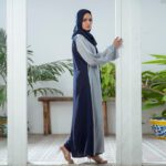 Pastel blue and navy Nidha open-front abaya with handwork on the front – formal modest wear