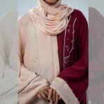Pastel pink and maroon Nidha open-front abaya with handwork on the front – formal modest wear