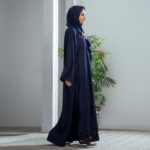 Midnight Bloom Abaya – Navy blue open-front Nidha abaya with cutwork embroidery on sleeves and hemline