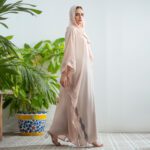 Pastel pink Sahar Blush Abaya in lightweight Nidha with embroidered cutwork cape design.